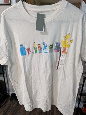Women’s Cream Short Sleeve Tee with Sesame Street Characters